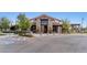 Exterior of the Skye Canyon community center showcasing stone and tile accents with ample parking at 9032 Skye Canyon Ranch St, Las Vegas, NV 89166