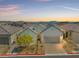 Beautiful single-story home featuring a three-car garage and manicured front yard at 9032 Skye Canyon Ranch St, Las Vegas, NV 89166