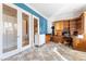 Stylish bedroom with blue accent wall, closet, and built-in desk at 10129 Elk Valley St, Las Vegas, NV 89178