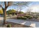 Welcoming entrance to the community with beautiful landscaping and signage at 10129 Elk Valley St, Las Vegas, NV 89178