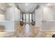 Elegant foyer featuring tile flooring, decorative columns, and a grand entrance door with sidelights at 10129 Elk Valley St, Las Vegas, NV 89178