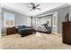 Primary bedroom with neutral walls, carpet flooring, and natural light at 10129 Elk Valley St, Las Vegas, NV 89178