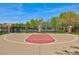 Outdoor basketball court featuring a full-court layout perfect for recreational games at 10288 Grizzly Forest Dr, Las Vegas, NV 89178