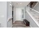 Spacious foyer with staircase and natural light at 10288 Grizzly Forest Dr, Las Vegas, NV 89178