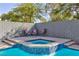 Enjoy outdoor relaxation with this amazing hot tub and backyard chairs at 10288 Grizzly Forest Dr, Las Vegas, NV 89178