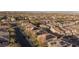 Aerial view of a community of homes featuring solar panels on their roofs at 10956 Hunting Hawk Rd, Las Vegas, NV 89179