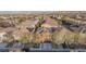 Aerial view of homes in a community, several with solar panels on the roofs at 10956 Hunting Hawk Rd, Las Vegas, NV 89179