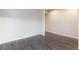 Spacious living room with wood-look floors, perfect for entertaining or relaxing at 10956 Hunting Hawk Rd, Las Vegas, NV 89179
