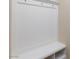 This mudroom features a built-in bench, coat hooks, and cubbies, perfect for organizing your belongings at 10956 Hunting Hawk Rd, Las Vegas, NV 89179