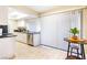 Well-lit kitchen featuring stainless steel appliances, granite countertops, and a casual dining space at 1390 Vegas Valley Dr # 30, Las Vegas, NV 89169