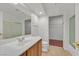 Bathroom with walk-in closet and glass shower door at 1401 Via Savona Dr, Henderson, NV 89052
