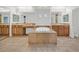 Primary bathroom featuring a soaking tub, double sinks, and neutral tile at 1401 Via Savona Dr, Henderson, NV 89052