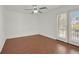 Bedroom featuring hardwood floors and double doors leading to a balcony at 1401 Via Savona Dr, Henderson, NV 89052