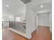 Hallway with hardwood floors and decorative railing at 1401 Via Savona Dr, Henderson, NV 89052