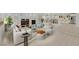 Spacious living room with fireplace, modern furniture, and neutral decor at 1401 Via Savona Dr, Henderson, NV 89052