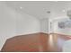 Empty living room with hardwood floors and natural light at 1401 Via Savona Dr, Henderson, NV 89052