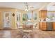 Cozy breakfast nook with natural light, tile floors, and views of the backyard at 1634 Georgia Ave, Boulder City, NV 89005