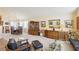 Expansive living room with bright lighting and elegant furnishings creates a warm and inviting atmosphere at 1634 Georgia Ave, Boulder City, NV 89005