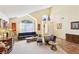 Spacious living room with high ceilings, large windows, and neutral colors at 1634 Georgia Ave, Boulder City, NV 89005