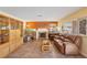 Cozy living room featuring tile flooring, entertainment center, and ample seating at 1634 Georgia Ave, Boulder City, NV 89005