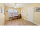 Bright office space featuring tile floors, built-in shelving, and sun-filled windows with pleasant views at 1634 Georgia Ave, Boulder City, NV 89005