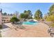 Backyard with an inviting pool, landscaped surroundings, and ample space for outdoor activities and gatherings at 1634 Georgia Ave, Boulder City, NV 89005
