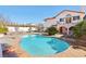 Backyard Oasis with a beautiful sparkling pool, spa, and patio, perfect for outdoor living and relaxation at 1634 Georgia Ave, Boulder City, NV 89005