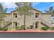 A charming multi-Gathering home featuring two stories with balconies and well-maintained landscaping at 1830 N Buffalo Dr # 1029, Las Vegas, NV 89128