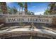 Stone sign reading Pacific Legends with desert landscaping underneath at 1830 N Buffalo Dr # 1029, Las Vegas, NV 89128