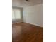 Bedroom with hardwood floors and a window at 1842 N Decatur Blvd # 101, Las Vegas, NV 89108