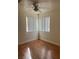 Bedroom featuring hardwood floors, a ceiling fan and natural light at 1842 N Decatur Blvd # 101, Las Vegas, NV 89108