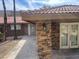 Exterior shows stonework on the pillars, a sidewalk, and doors with iron accents at 1842 N Decatur Blvd # 101, Las Vegas, NV 89108