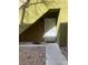 Exterior front door with security screen on a home with gravel landscaping at 1842 N Decatur Blvd # 101, Las Vegas, NV 89108