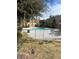 Community pool with a secure fenced perimeter, and surrounding green landscaping at 1842 N Decatur Blvd # 101, Las Vegas, NV 89108