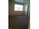 Bright bedroom featuring a large window and spacious closet at 1851 Hillpointe Rd # 2112, Henderson, NV 89074