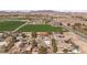 This is a serene aerial view of countryside residences, bordered by agricultural land and distant mountains at 1951 Jim Haworth Ct, Logandale, NV 89021