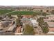 Expansive rural property featuring ample parking, mature trees, and a backdrop of distant mountains at 1951 Jim Haworth Ct, Logandale, NV 89021