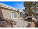 Backyard patio featuring outdoor seating area and views of landscaping at 1951 Jim Haworth Ct, Logandale, NV 89021