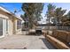 Backyard patio featuring outdoor seating area, grill and well maintained landscaping at 1951 Jim Haworth Ct, Logandale, NV 89021