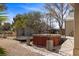 Backyard featuring a trampoline, hot tub, and outdoor seating area at 1951 Jim Haworth Ct, Logandale, NV 89021