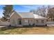 Charming single-story home featuring a unique metal roof and drought-resistant front yard at 1951 Jim Haworth Ct, Logandale, NV 89021