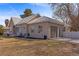 Charming single-story home featuring a unique metal roof and attached garage at 1951 Jim Haworth Ct, Logandale, NV 89021