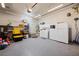 Spacious garage featuring ample storage space, and modern appliances at 1951 Jim Haworth Ct, Logandale, NV 89021