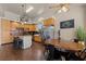 Open concept kitchen with stainless steel appliances, granite counter tops and wood cabinets at 1951 Jim Haworth Ct, Logandale, NV 89021