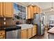 Well-lit kitchen featuring a large stainless steel refrigerator and modern appliances at 1951 Jim Haworth Ct, Logandale, NV 89021