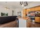 Spacious living room with an island separating the kitchen with modern stainless steel appliances at 1951 Jim Haworth Ct, Logandale, NV 89021