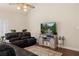 Living room featuring a wall-mounted tv, hardwood floors, and a ceiling fan at 1951 Jim Haworth Ct, Logandale, NV 89021