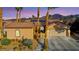 Charming single-story home featuring a well-manicured lawn, desert landscaping, and a spacious two-car garage at 2140 Idaho Falls Dr, Henderson, NV 89044