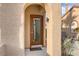 Close-up view of the front door, showing its design and hardware details at 2140 Idaho Falls Dr, Henderson, NV 89044