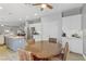 Spacious kitchen features stainless steel appliances, ample cabinet space, and a breakfast nook with wicker chairs at 2140 Idaho Falls Dr, Henderson, NV 89044